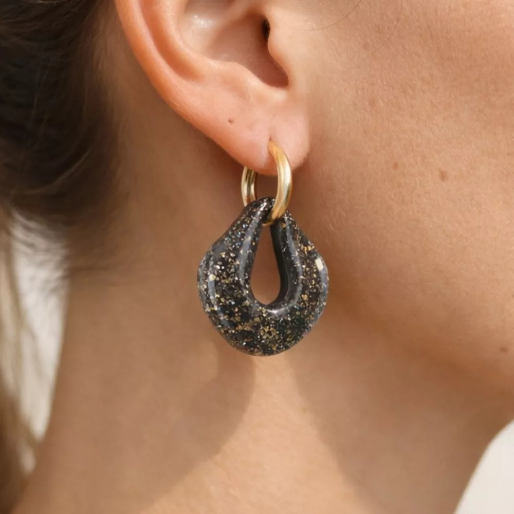 gouttes noires et or